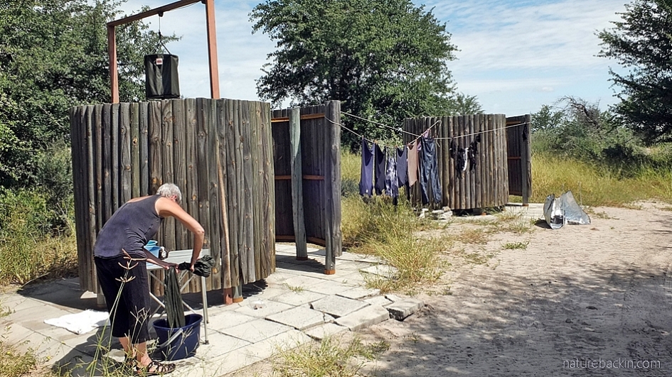 Doing the washing and facilities at the Leopard Pan campsite at the Central Kalahari Game Reserve, Botswana